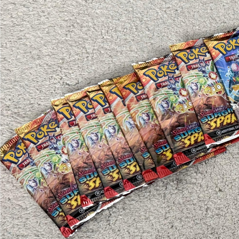Pokemon Trading Card Surging Sparks Booster Pack 10 cards Per pack $13